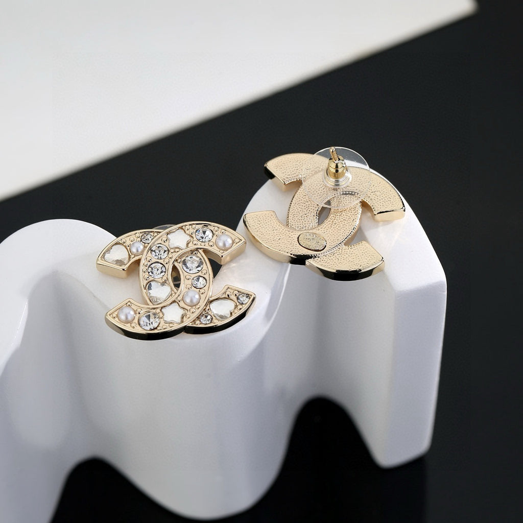 Chanel Interlocking C Gold-Tone Star Stud Earrings - album image 6