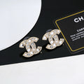 Chanel Interlocking C Gold-Tone Star Stud Earrings - album image 1