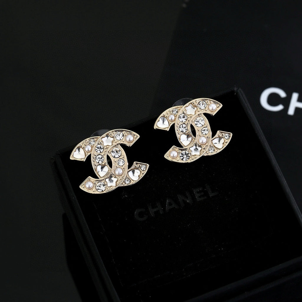 Chanel Interlocking C Gold-Tone Star Stud Earrings - album image 2
