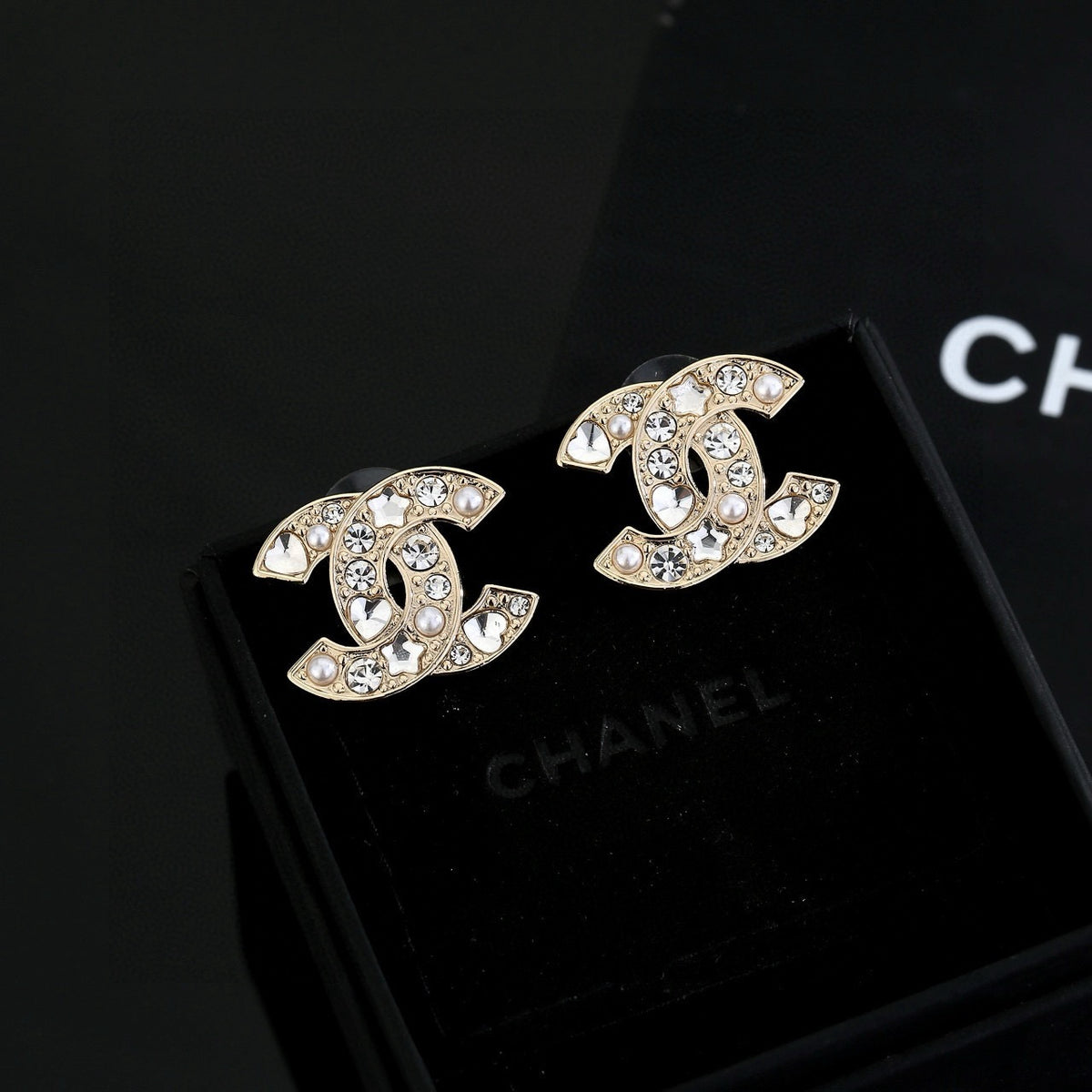 Chanel Interlocking C Gold-Tone Star Stud Earrings - album image 2