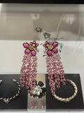 Chanel Interlocking C Resin Gold-Tone Pink Pearl Earrings - album image 1