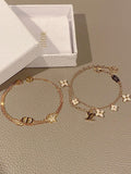 Louis Vuitton White Flower Bracelet - album image 1