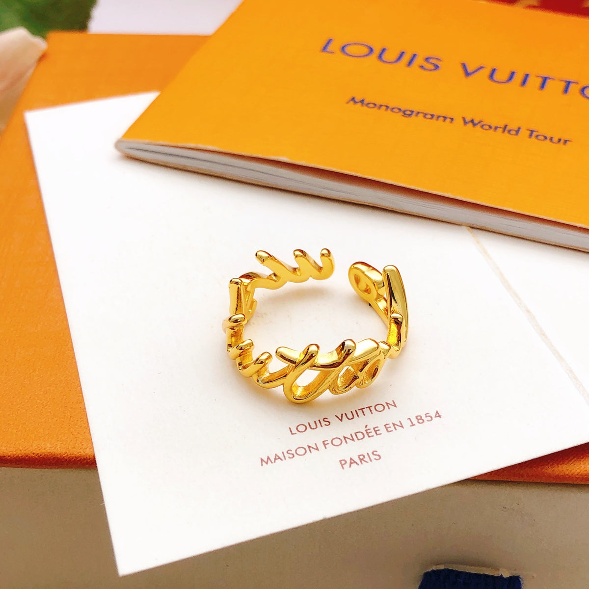 Louis Vuitton Gold-Tone Open LV Ring - album image 4