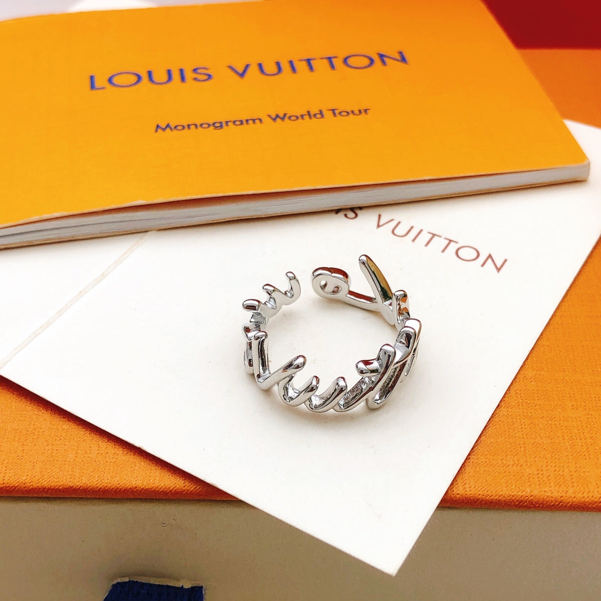 Louis Vuitton Silver-Tone Open LV Ring - album image 3