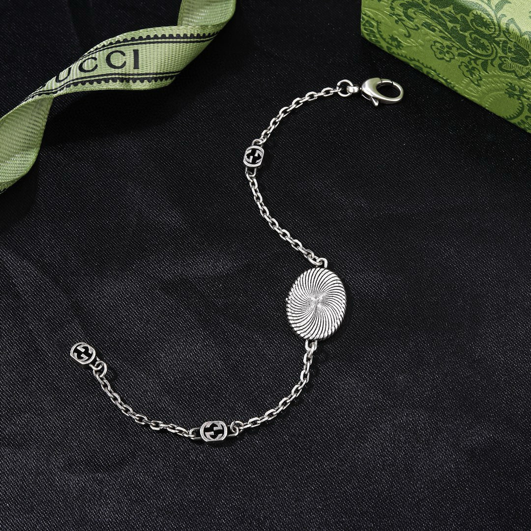 Gucci Silver-Tone Coin Charm Jewelry Options - album image 8