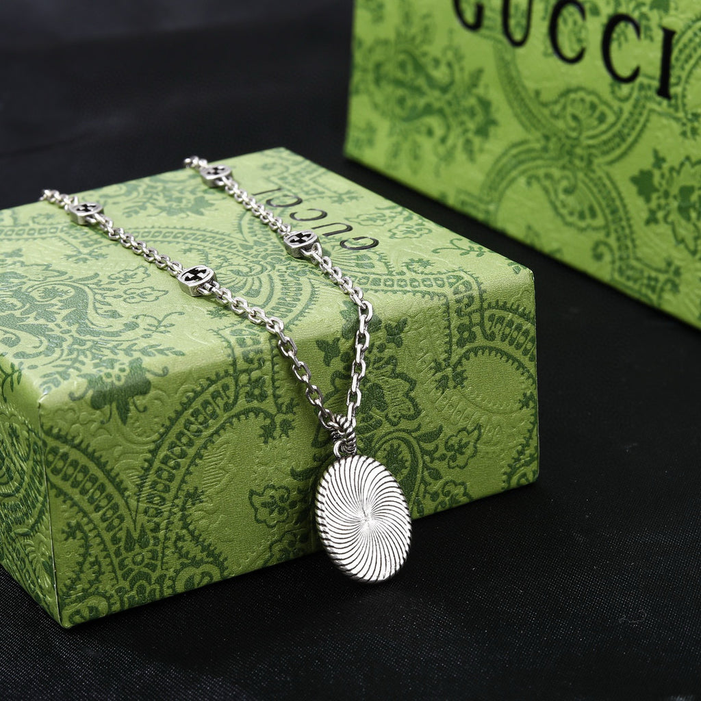 Gucci Silver-Tone Coin Charm Jewelry Options - album image 5