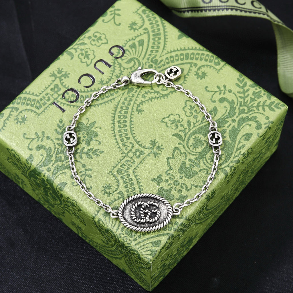 Gucci Silver-Tone Coin Charm Jewelry Options - album image 4