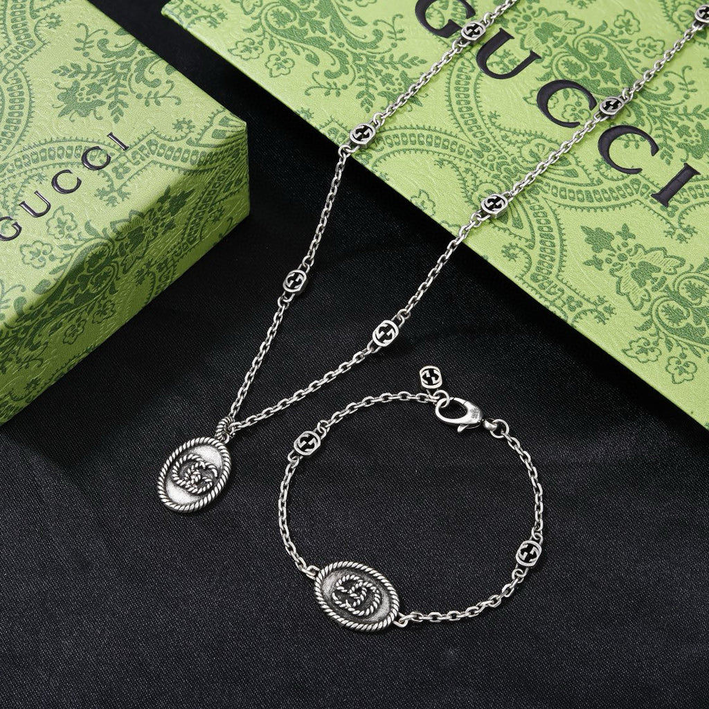 Gucci Silver-Tone Coin Charm Jewelry Options - album image 7