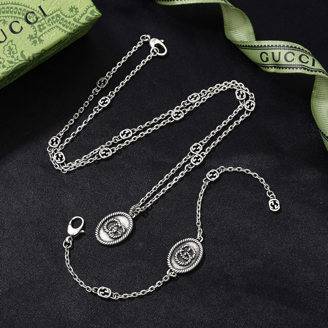 Gucci Silver-Tone Coin Charm Jewelry Options - album image 6