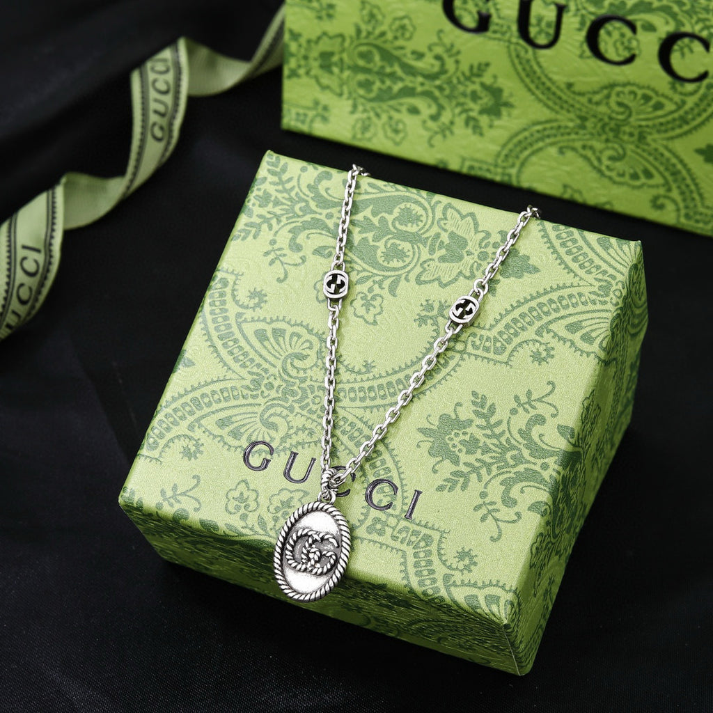 Gucci Silver-Tone Coin Charm Jewelry Options - album image 3