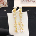 Dior Pearl-Look Vertical Letter Earrings - product image 1