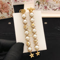 Dior Pearl-Look Chain Star Earrings - product image 1