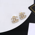 Chanel Gold-Tone Floral CC Stud Earrings - album image 1