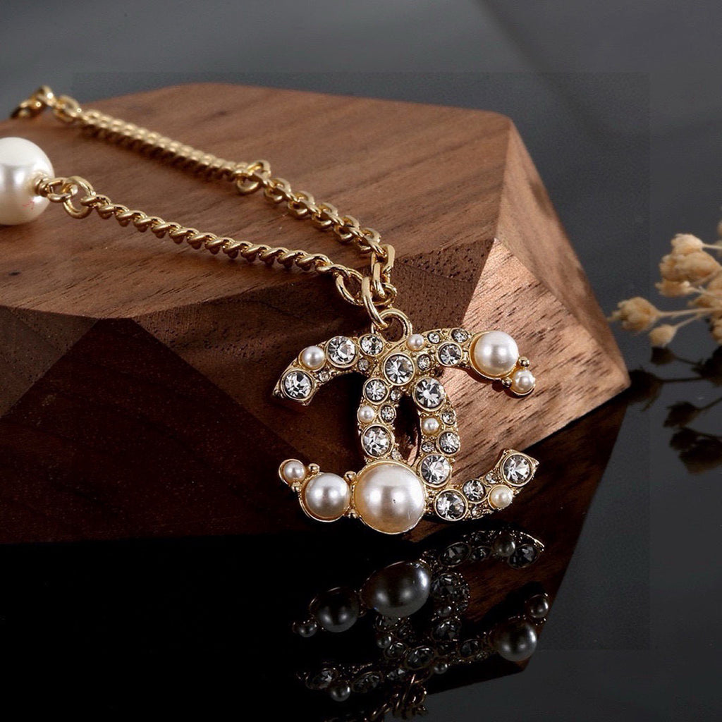 Chanel Interlocking C Pearl Necklace - album image 7