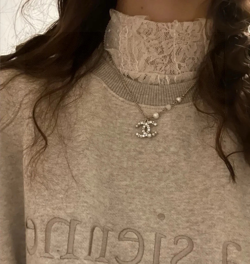 Chanel Interlocking C Pearl Necklace - album image 9
