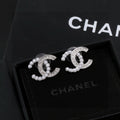 Chanel Gold-Tone CC Stud Earrings - album image 1