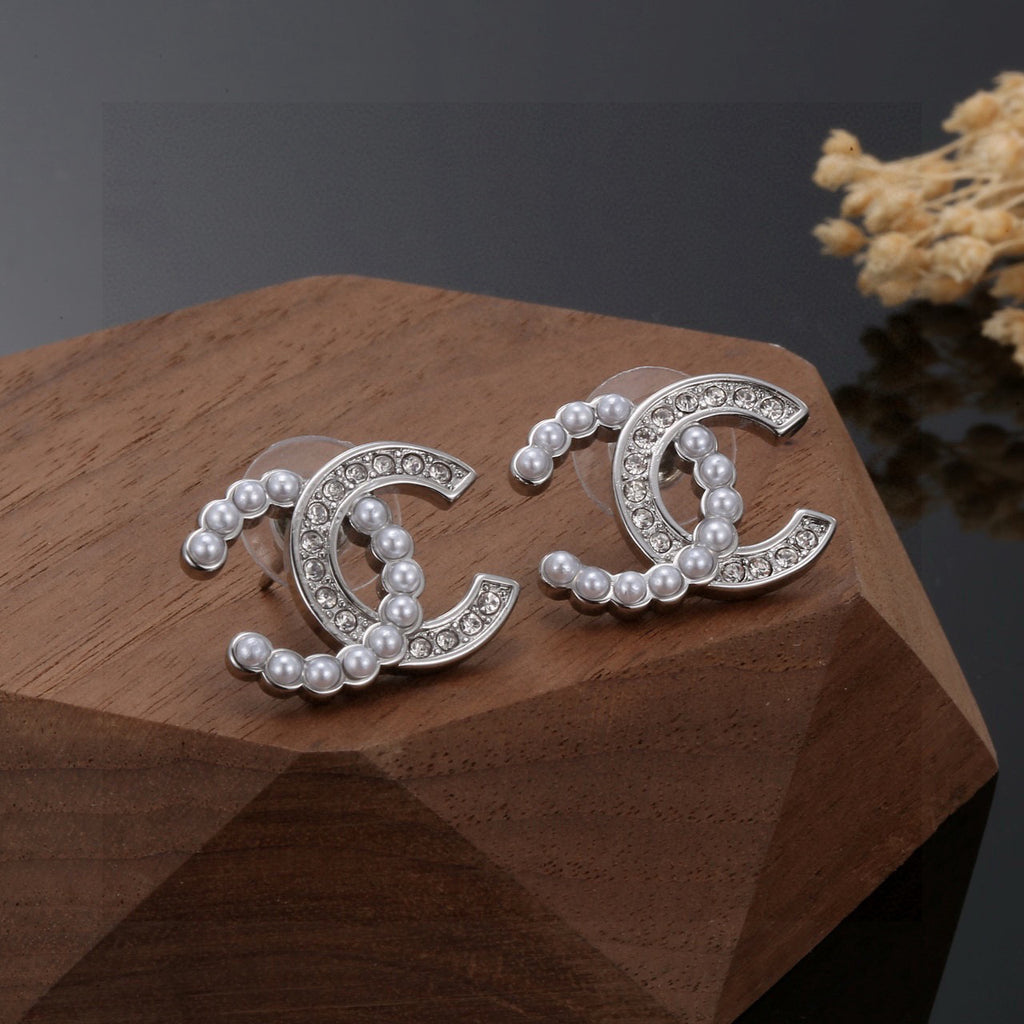 Chanel Gold-Tone CC Stud Earrings - album image 8