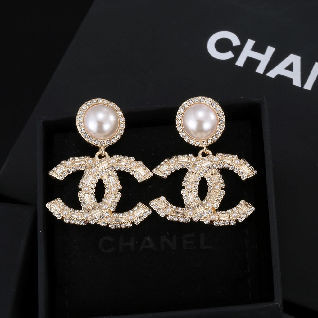 Chanel Interlocking C Gold-Tone Pearl Crystal Accent Earrings - album image 1