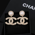 Chanel Interlocking C Gold-Tone Pearl Crystal Accent Earrings - album image 1