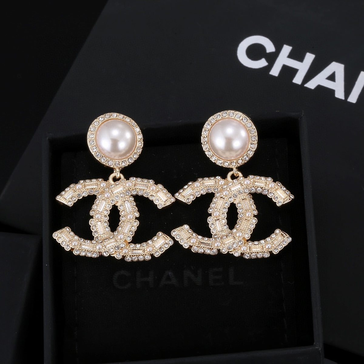 Chanel Interlocking C Gold-Tone Pearl Crystal Accent Earrings - album image 1