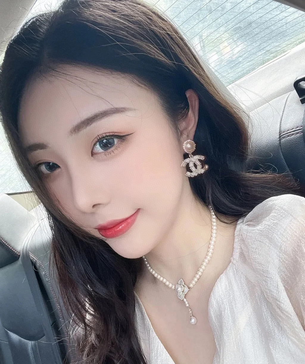Chanel Interlocking C Gold-Tone Pearl Crystal Accent Earrings - album image 4
