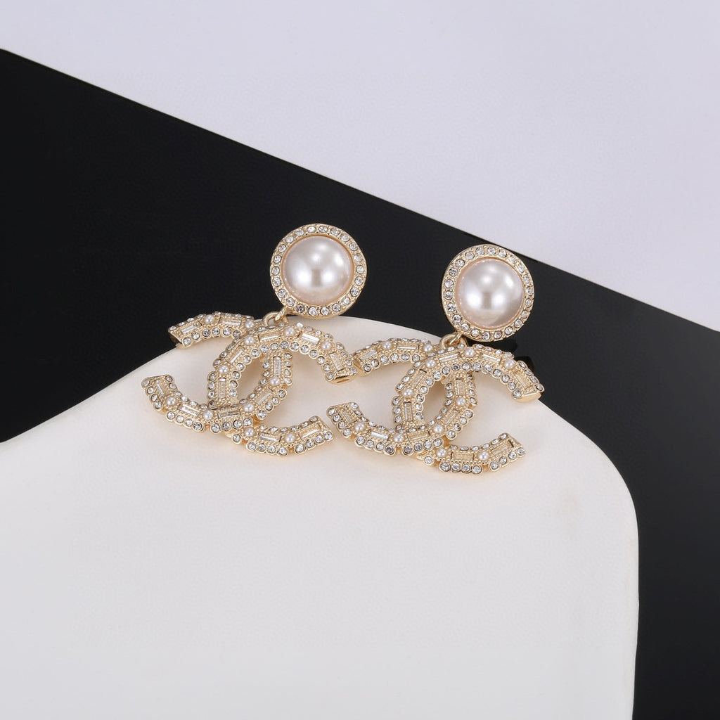 Chanel Interlocking C Gold-Tone Pearl Crystal Accent Earrings - album image 6