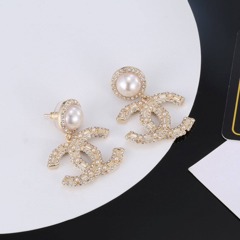 Chanel Interlocking C Gold-Tone Pearl Crystal Accent Earrings - album image 2
