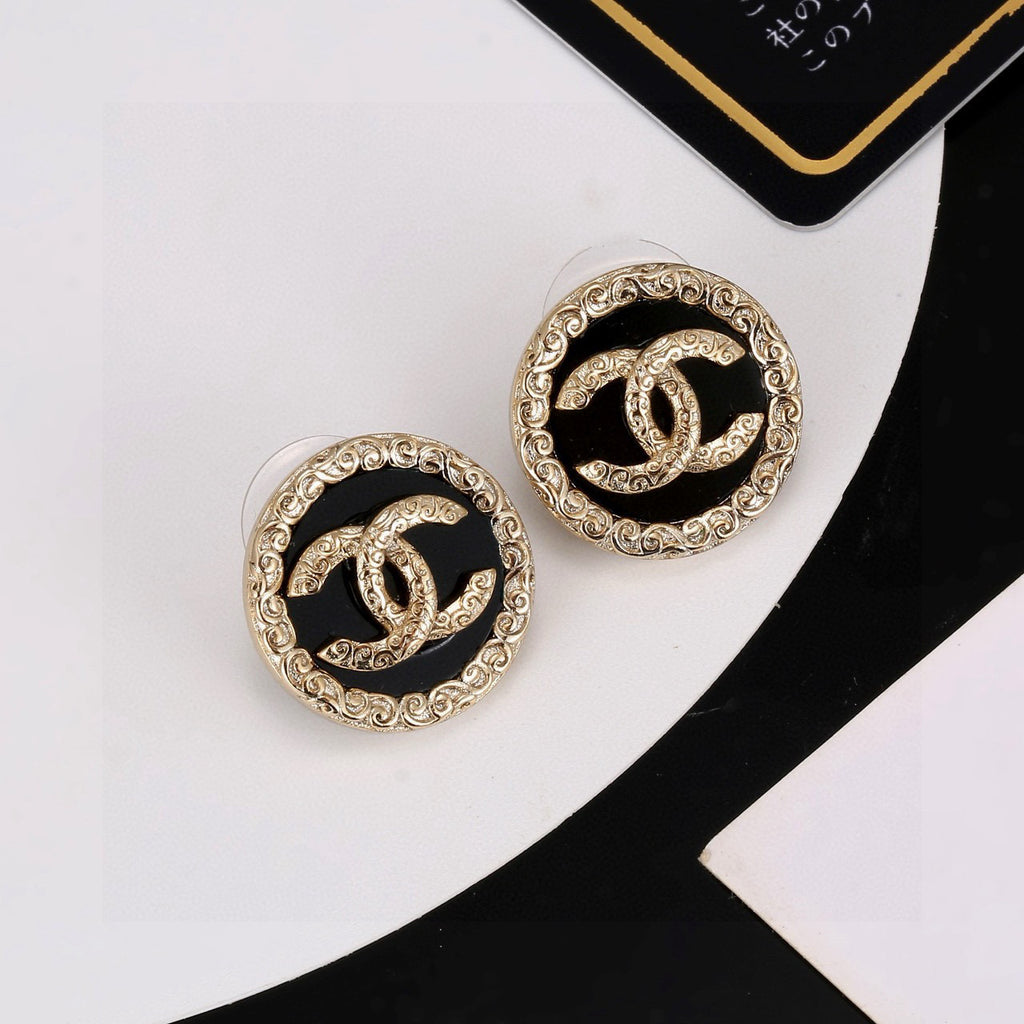 Chanel Interlocking C Black Circular Earrings - album image 3
