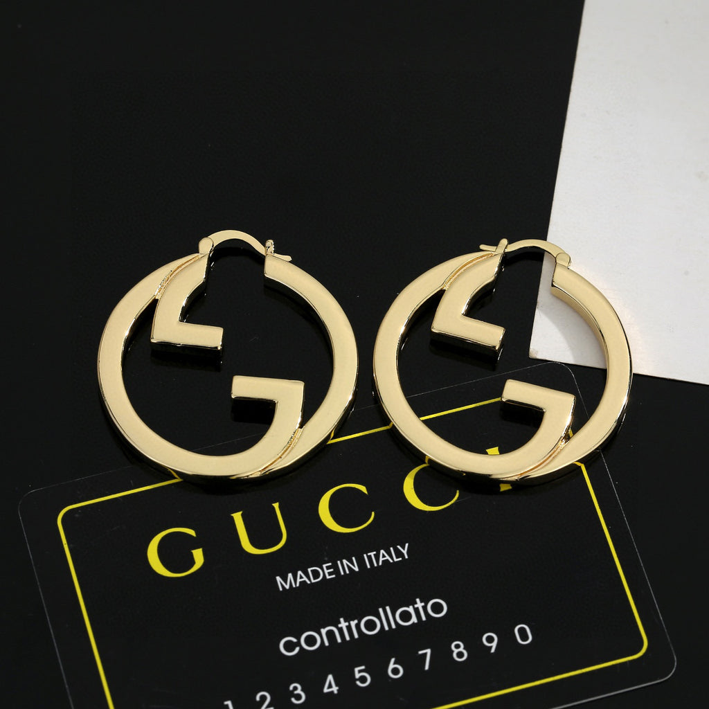 Gucci GG Circular Hoop Earrings in Gold and Silver Tones - album image 2