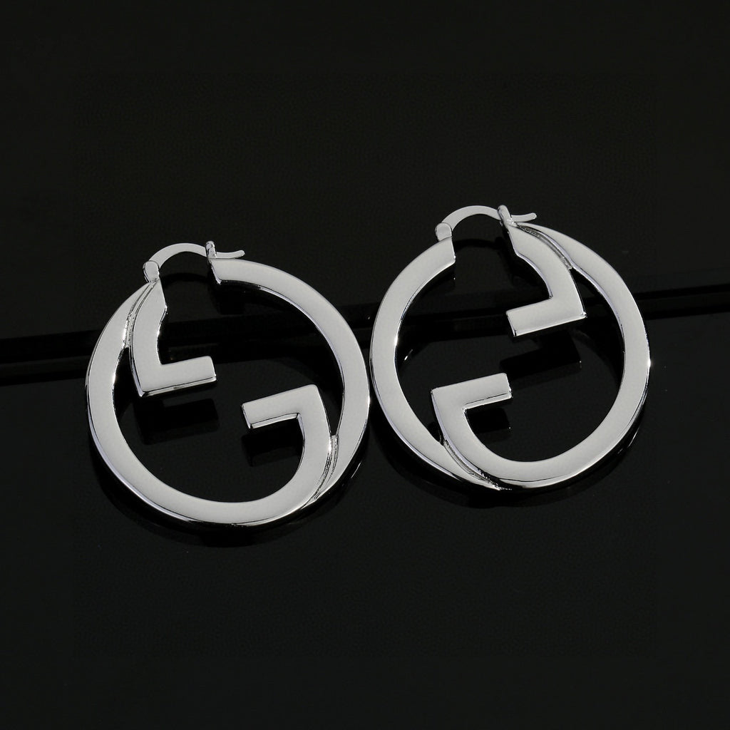 Gucci GG Circular Hoop Earrings in Gold and Silver Tones - album image 4