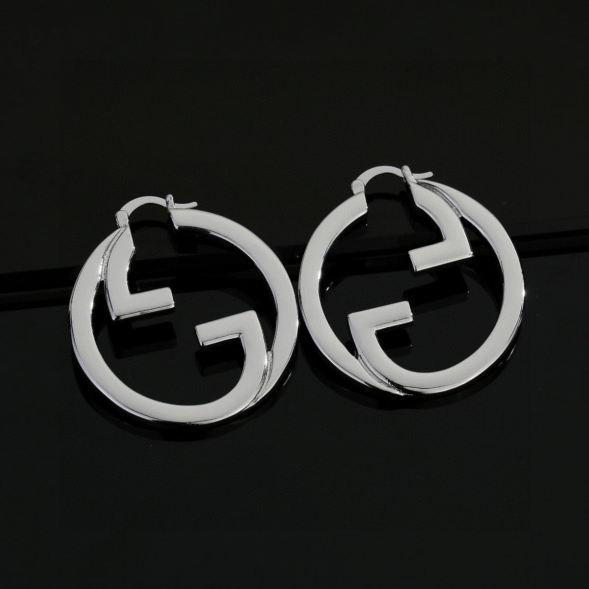 Gucci GG Circular Hoop Earrings in Gold and Silver Tones - album image 4