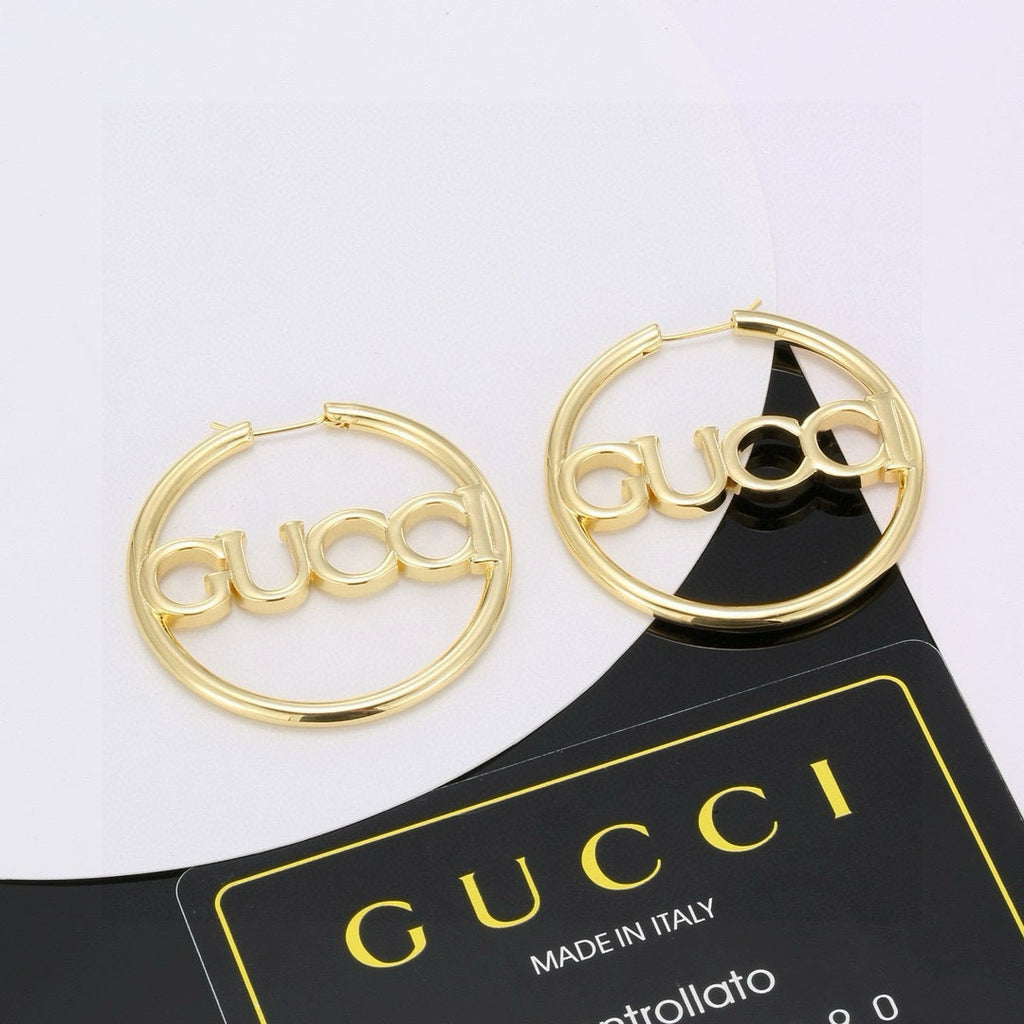 Gucci Gold-Tone Circular Triple G Hoop Earrings - album image 1