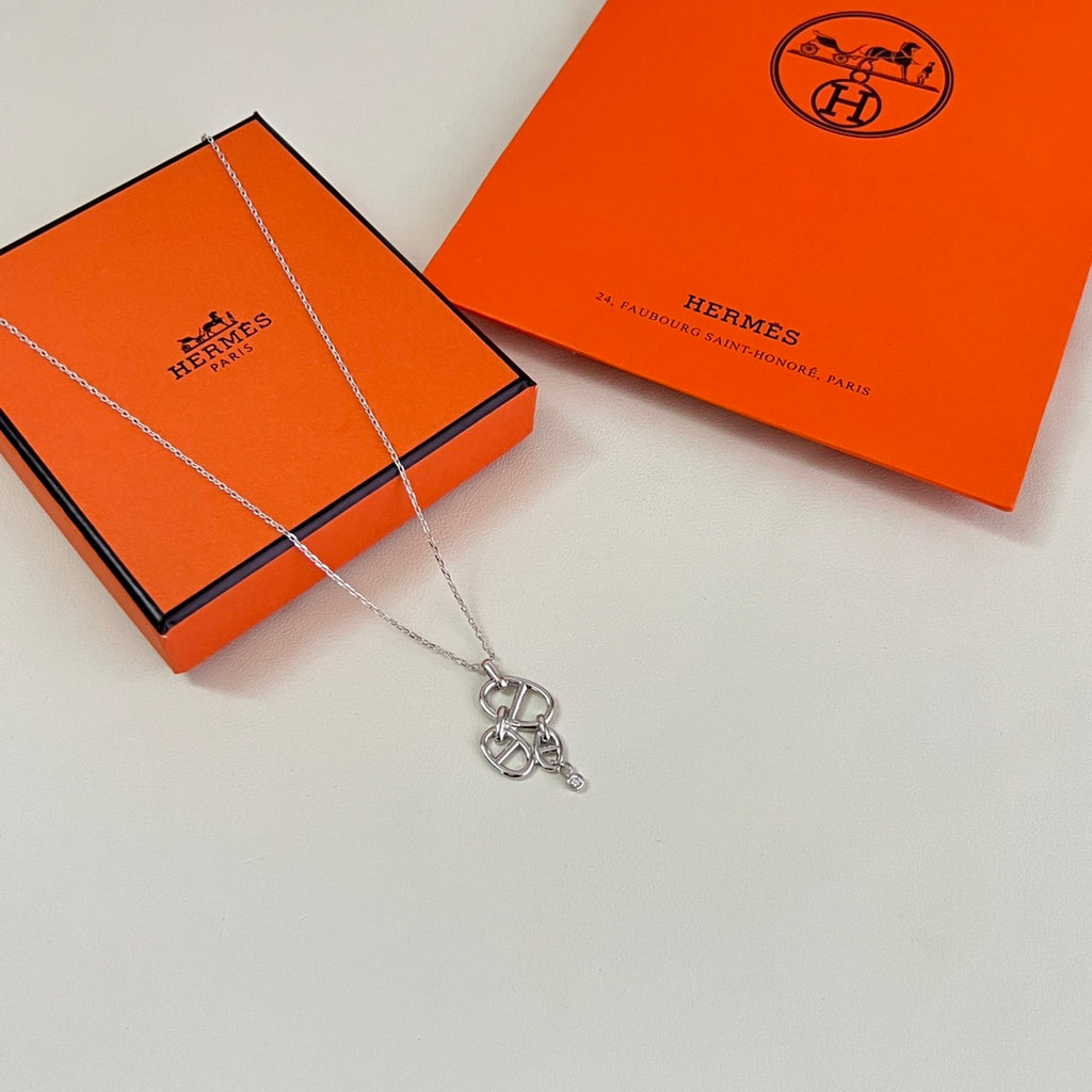 Hermès Silver-Tone Horse-Head Outline Pendant Necklace - album image 1