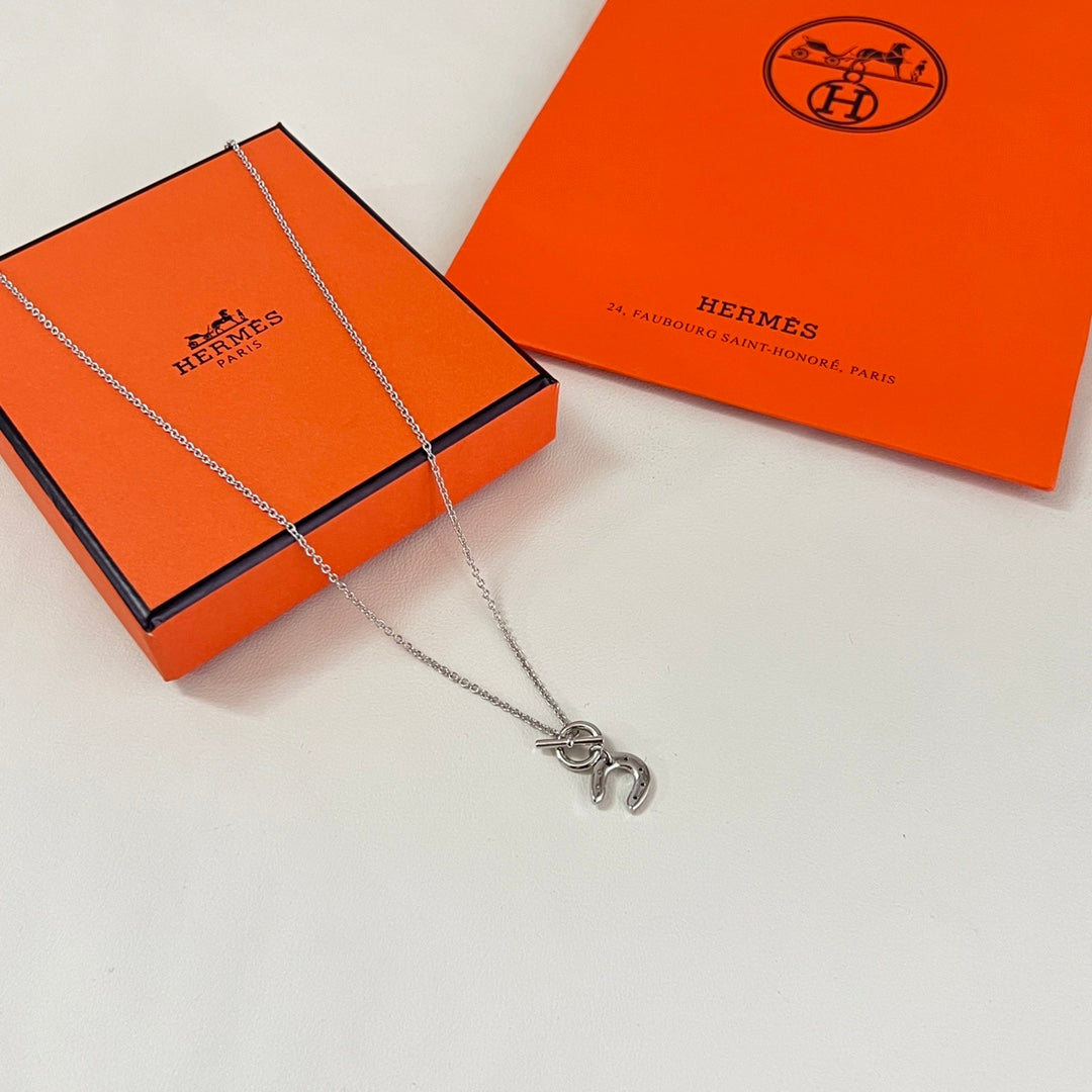 Hermès Silver-Tone Anchor Pendant Necklace - album image 1