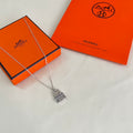 Hermès Silver-Tone Patterned Square Pendant Necklace - album image 1