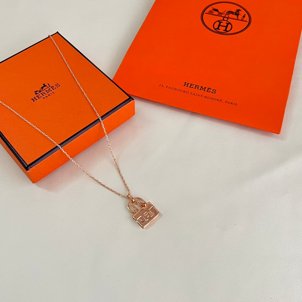 Hermès Rose Gold-Tone Patterned Square Pendant Necklace - album image 1