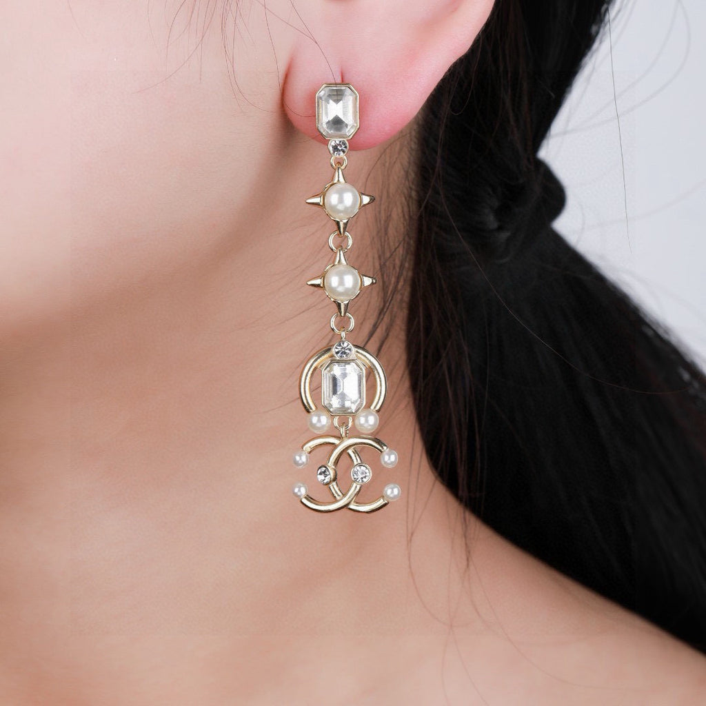 Chanel Crystal Star and CC Long Drop Earrings - album image 1