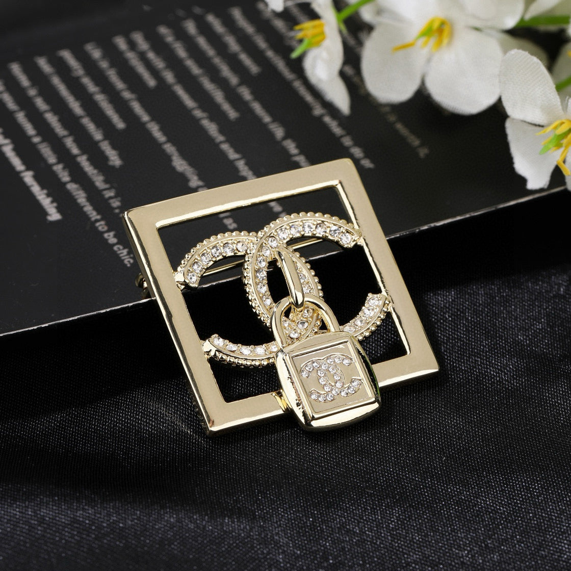 Chanel Interlocking C Padlock Brooch - album image 3