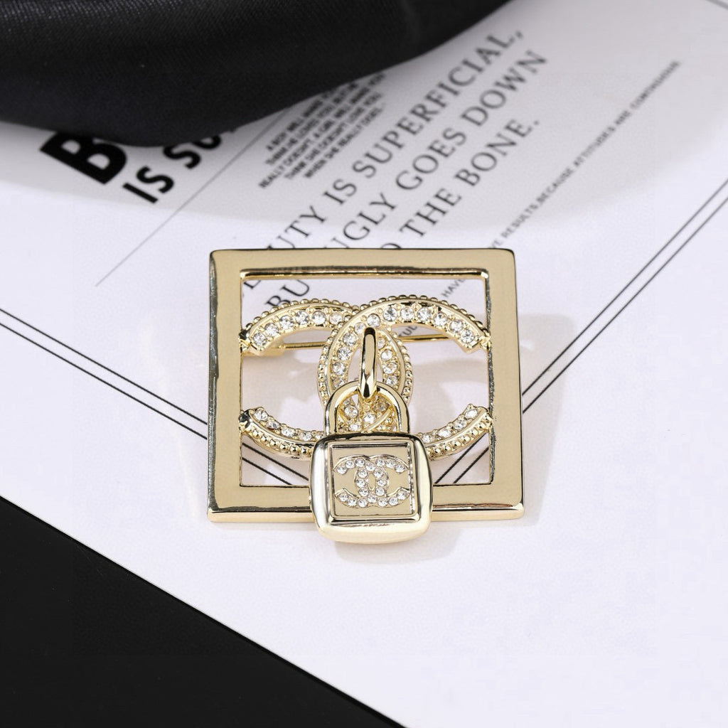 Chanel Interlocking C Padlock Brooch - album image 2