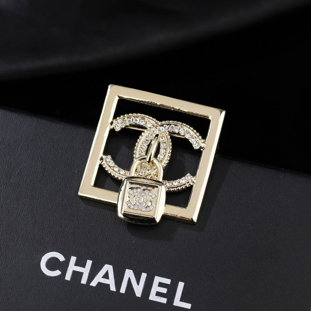 Chanel Interlocking C Padlock Brooch - album image 1