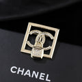 Chanel Interlocking C Padlock Brooch - album image 1