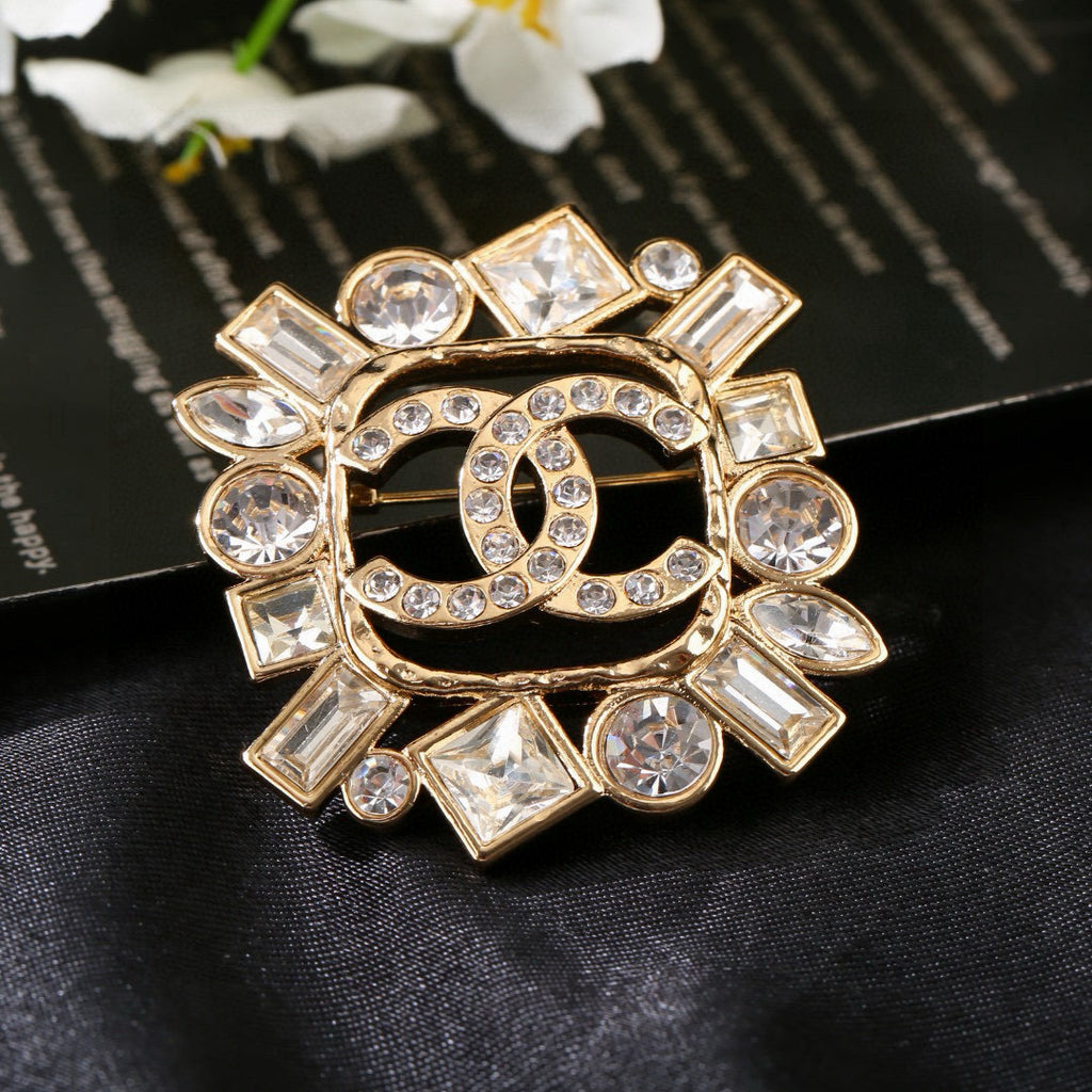 Chanel Interlocking C Crystal Accent Brooch - album image 1