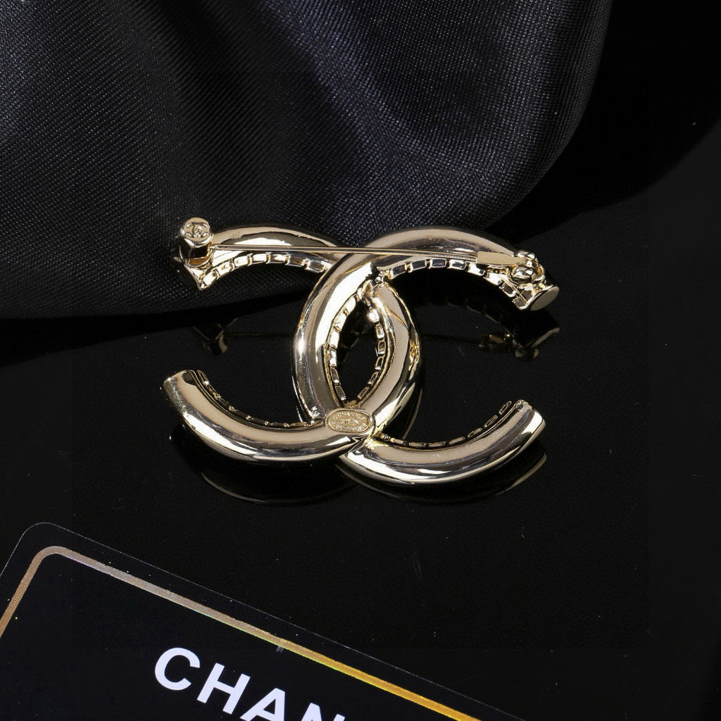 Chanel Gold-Tone Sculptural CC Brooch - album image 7