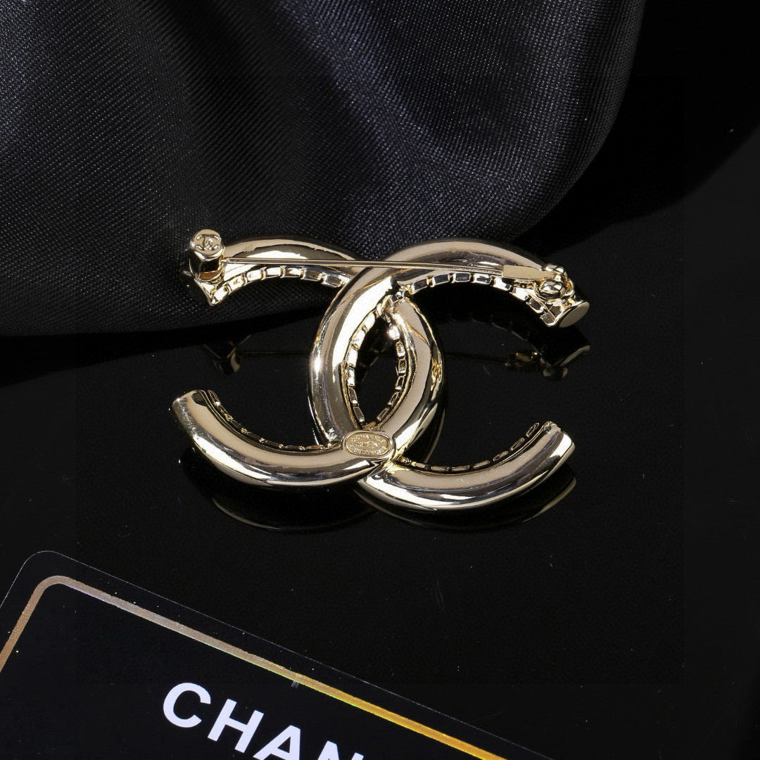 Chanel Gold-Tone Sculptural CC Brooch - album image 7