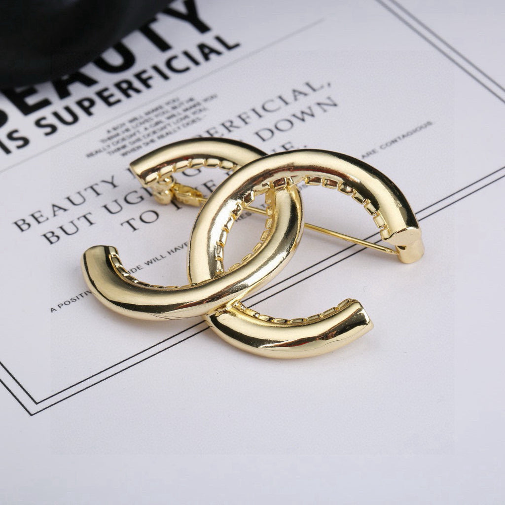 Chanel Gold-Tone Sculptural CC Brooch - album image 2