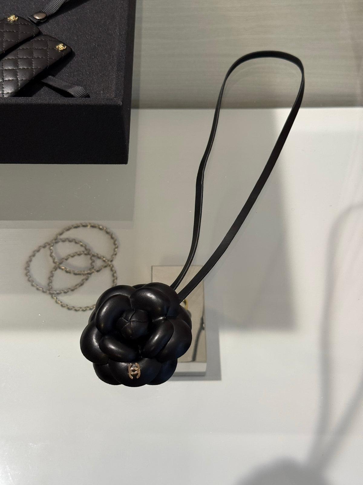 Chanel Interlocking C Camellia Key Gold-Tone Black Keychain - album image 2
