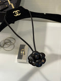 Chanel Interlocking C Camellia Gold-Tone Black Mini Bag Charm - album image 1