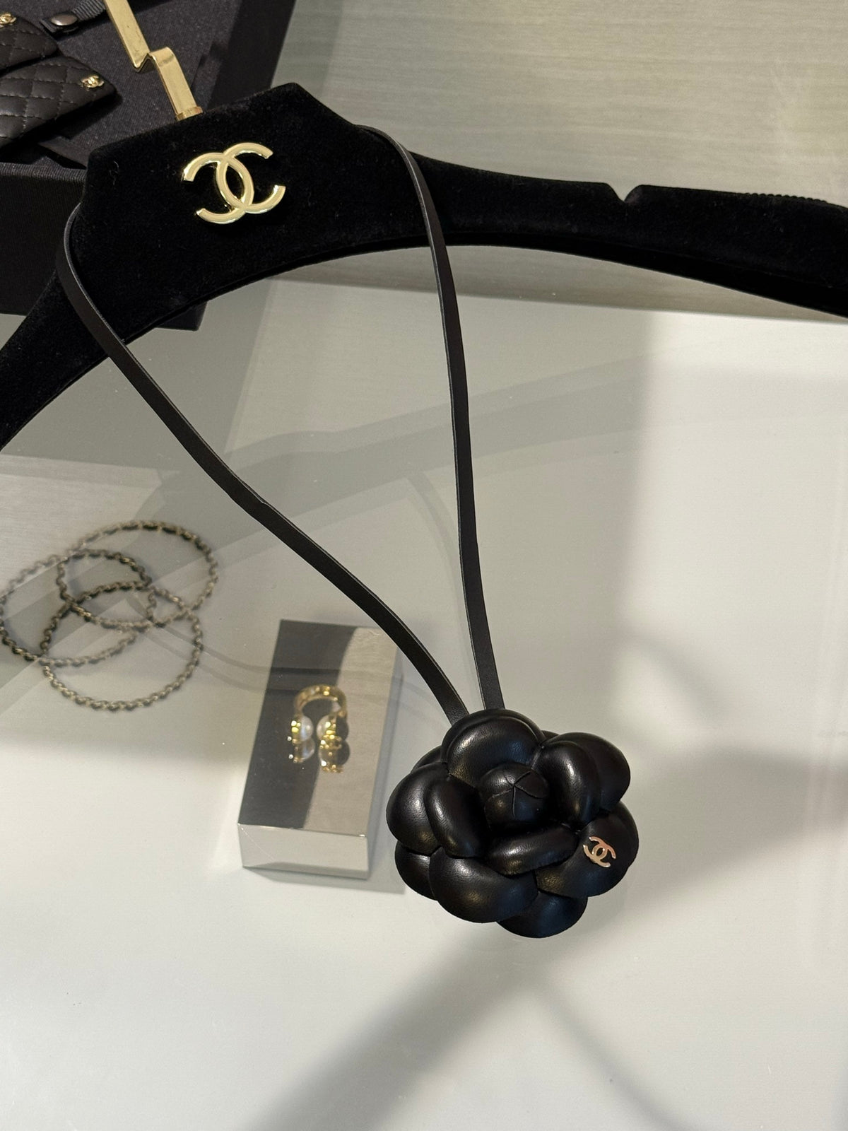 Chanel Interlocking C Camellia Gold-Tone Black Mini Bag Charm - album image 1