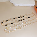 Hermès Gold-Tone Multistrand Black and White Bead Necklace - album image 1