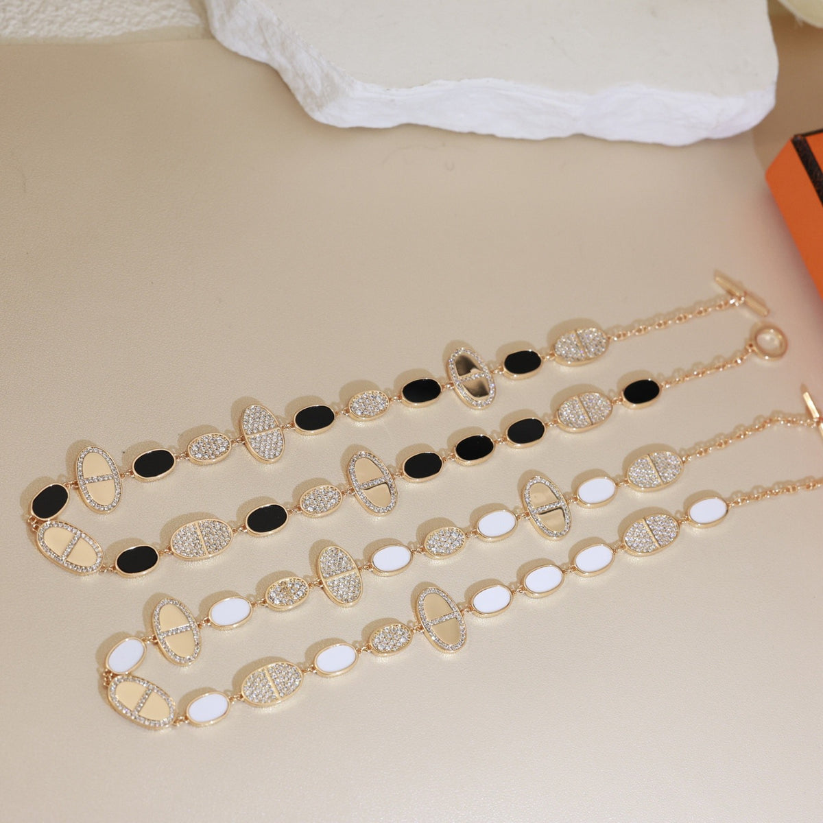 Hermès Gold-Tone Multistrand Black and White Bead Necklace - album image 1